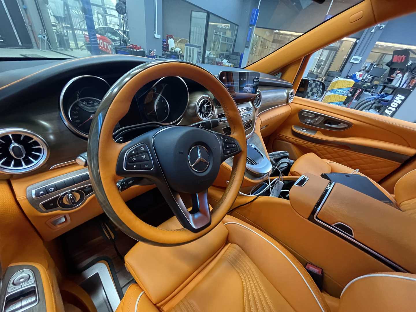 V260 cockpit in Hermès orange, published by Mach5 Performance.